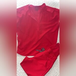 Women’s FIGS scrubs in bright red